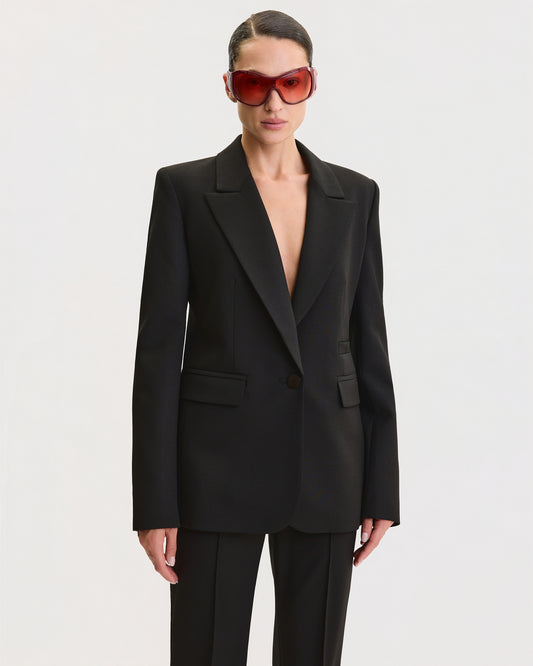 THE SIGNATURE FLARE SUIT