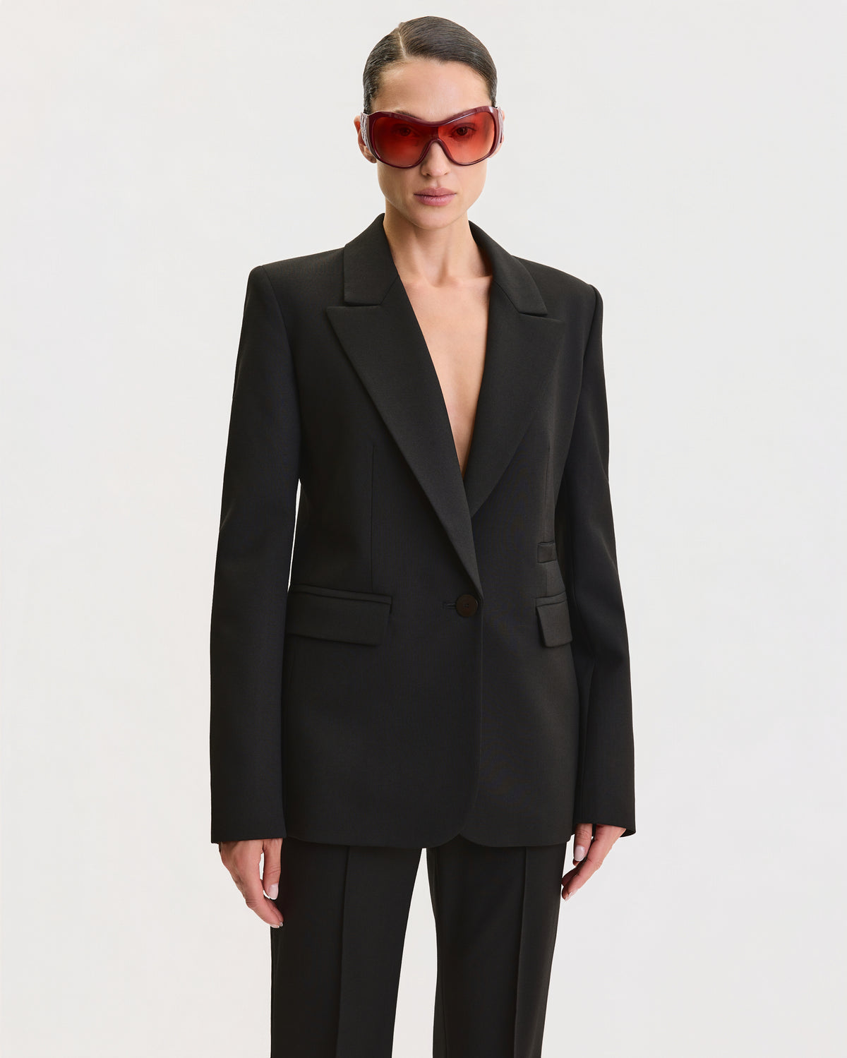 THE SIGNATURE FLARE SUIT