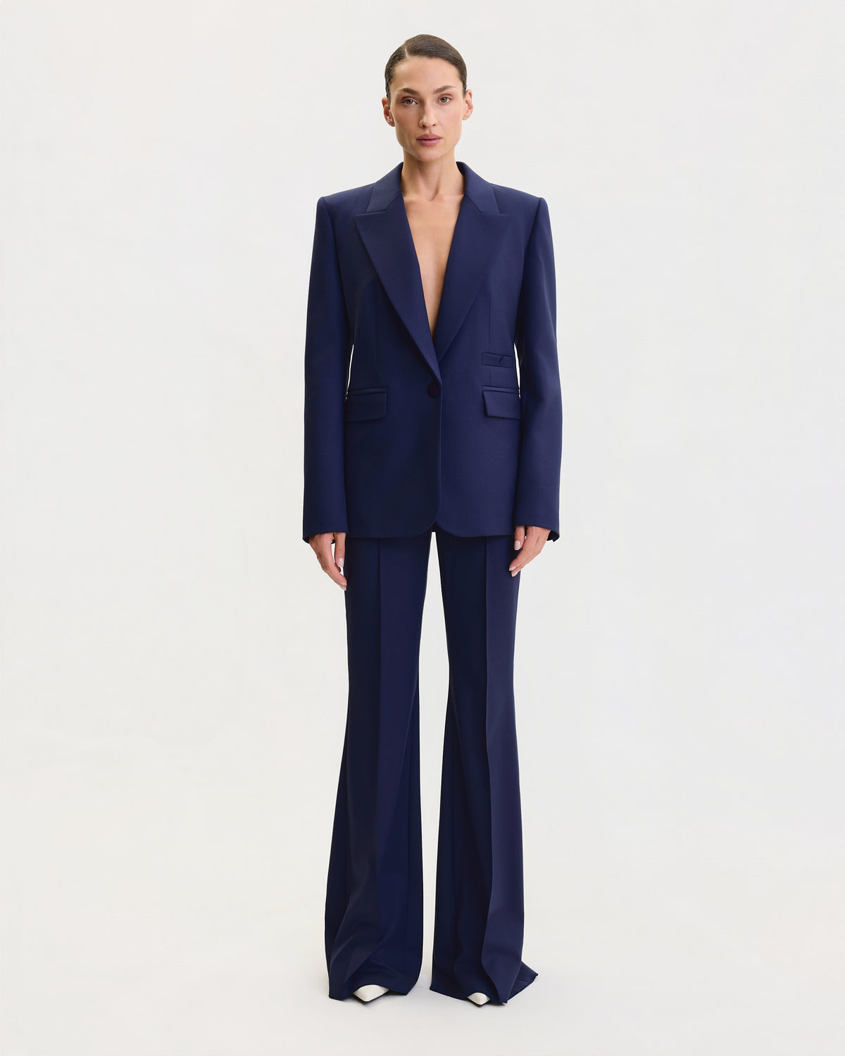 THE SIGNATURE FLARE SUIT
