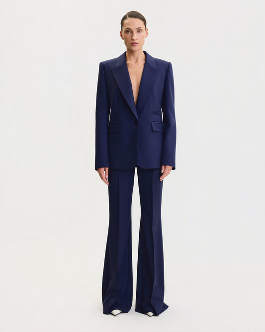 THE SIGNATURE FLARE SUIT